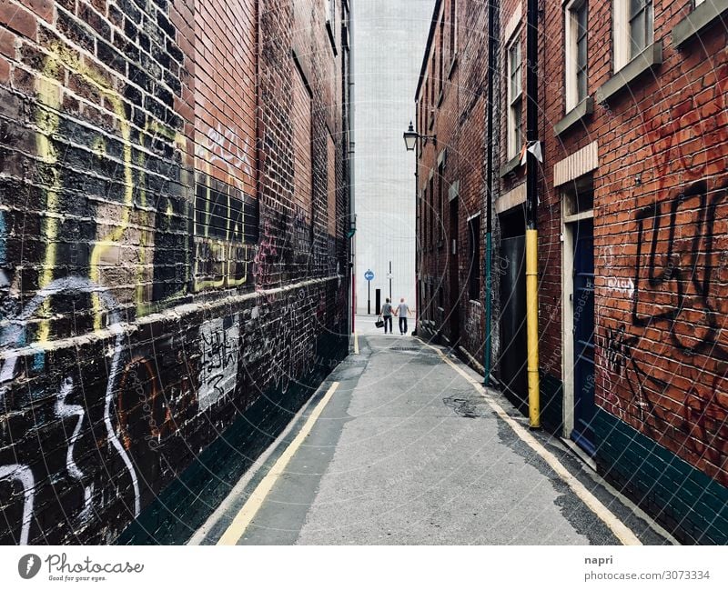 At the end of the street, Sheffield. Couple Adults 2 Human being England Town Downtown House (Residential Structure) Alley Wall (barrier) Wall (building) Facade