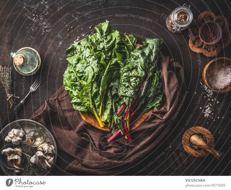 Colourful chard bundles on a rustic kitchen table Food Vegetable Nutrition Organic produce Vegetarian diet Diet Crockery Style Healthy Healthy Eating Table