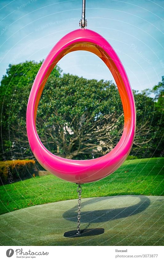 Pink egg-shaped swing in a Sydney park - Australia Playing Garden Sports Child Art Culture Nature Landscape Tree Grass Park Town Deserted Steel To enjoy Hang