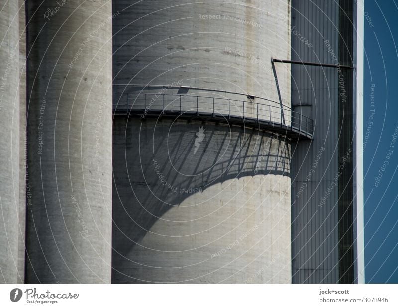 Shadows of the industry Industry Silo Footbridge rail Concrete Line Authentic Large Tall Modern Gray Esthetic Symmetry Shadow play Construction Round