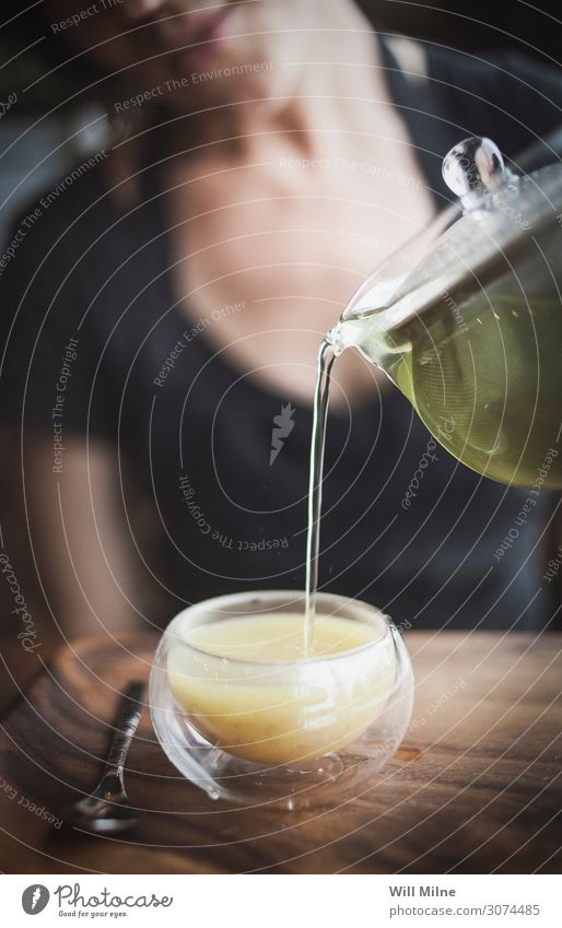 Woman Pouring Green Tea from a Kettle Young woman Pour on mug Glass Coffee Café Free Leaf Fluid Liquid Beverage Drinking Hot Teatime