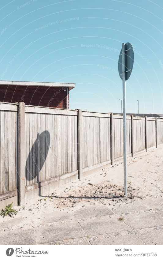 Danish separation Cloudless sky Beautiful weather Denmark Industrial plant Fence Wall (barrier) Wood Signs and labeling Road sign Wait Blue Calm Orderliness
