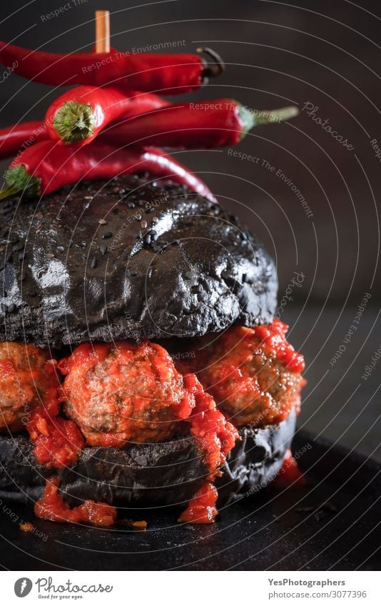 Black bread hamburger with meatballs and tomato sauce Meat Buffet Brunch Diet Fast food Dark Red appetizer black burger Dish dripping sauce Gourmet