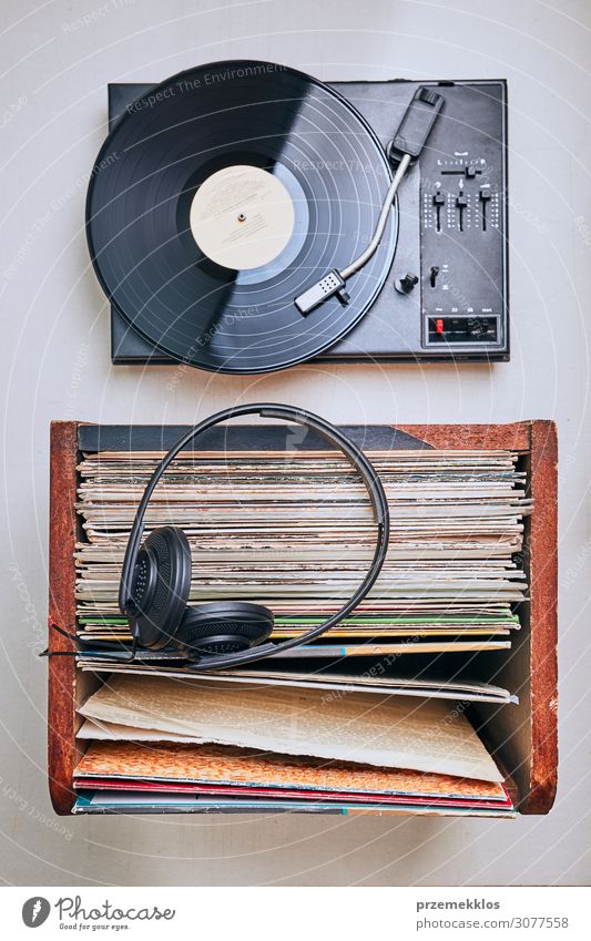Vinyl records and turntable vinyl player Lifestyle Style Entertainment Music Technology Youth culture Subculture Listen to music Record Collection Listening