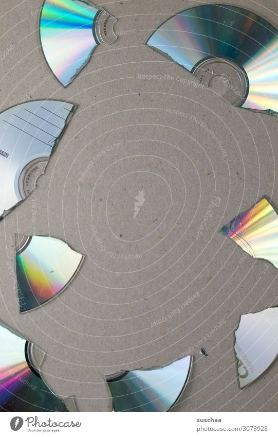 veteran CD DVD-ROM Slice Broken Digital Data storage Shard Happy Round Reflection Prismatic colour Old Archaic Technology Music Video data collection Data bank