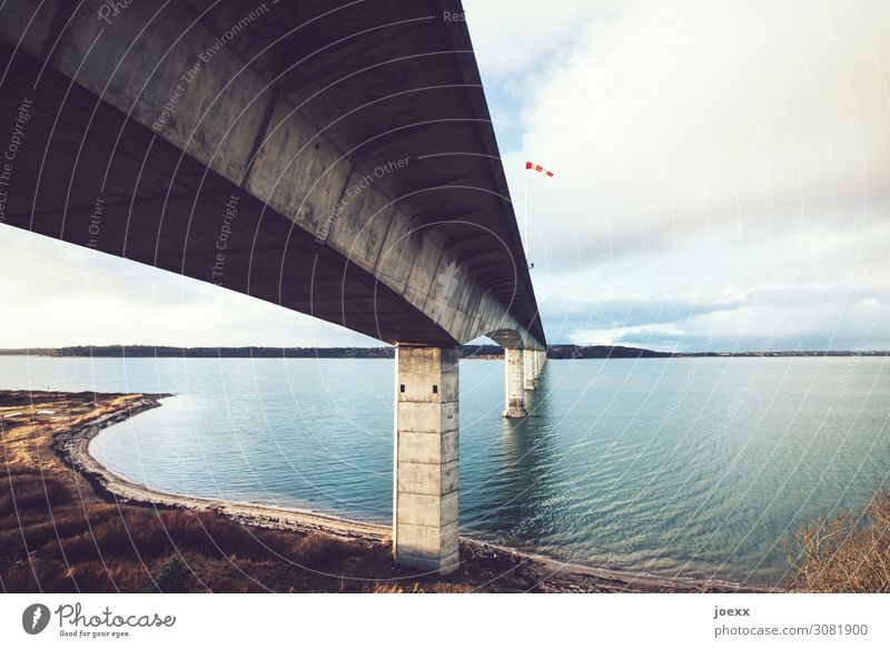 wind tunnel Landscape Sky Bay Denmark Bridge Concrete Large Tall Blue Brown Gray Red White Windsock Colour photo Exterior shot Deserted Day Contrast Sunlight