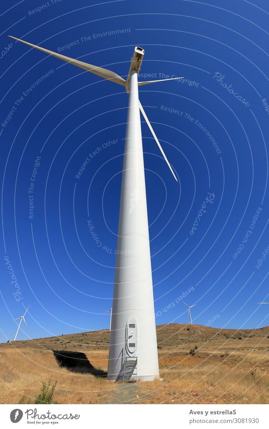 Windmill with blue sky. Wind and renewable energy Energy turbine power Energy industry Electricity Generator Sky Environment Alternative Renewable