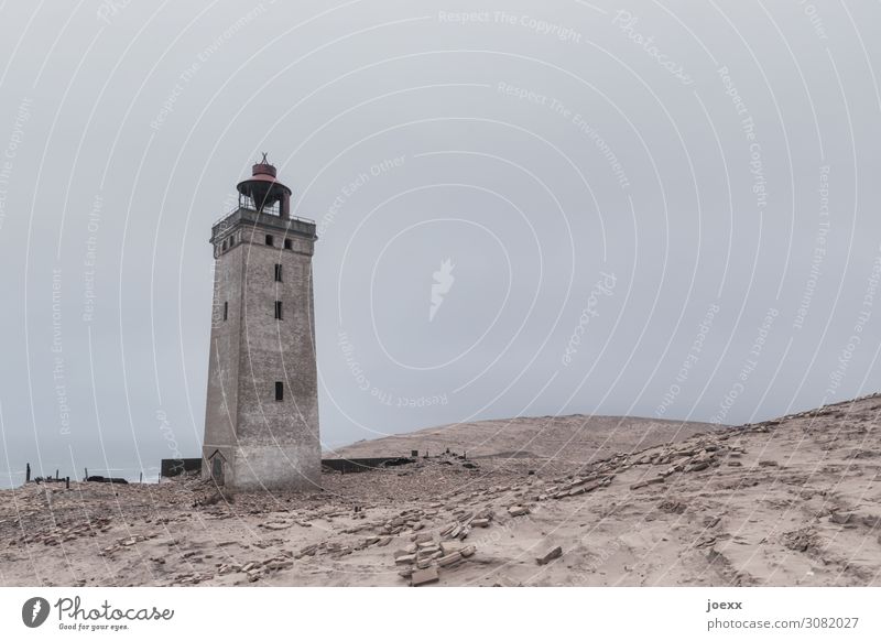 Old lighthouse Rubjerg Knude Fyr in Danish dunes Day Exterior shot Subdued colour Colour photo Red Brown Historic Tourist Attraction Lighthouse Denmark Dune