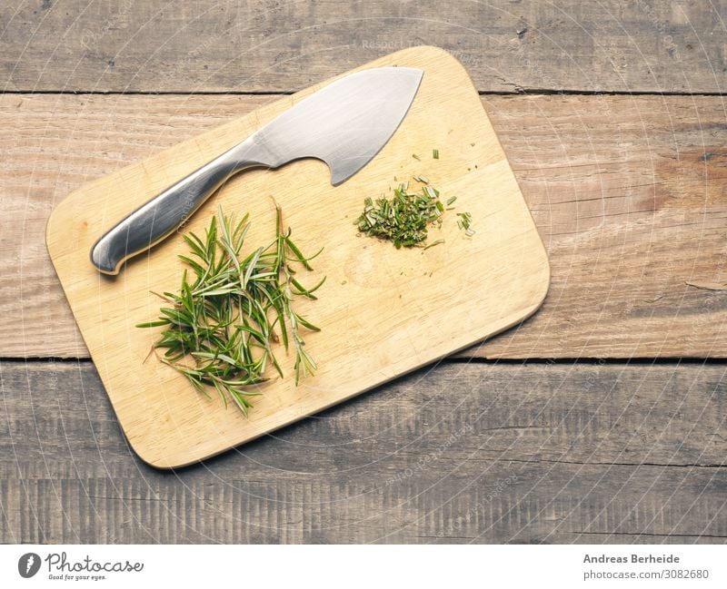 Rosemary freshly chopped twigs knife chopping board Herbs and spices Nutrition Organic produce Vegetarian diet Knives Nature Wood Delicious Vegan diet