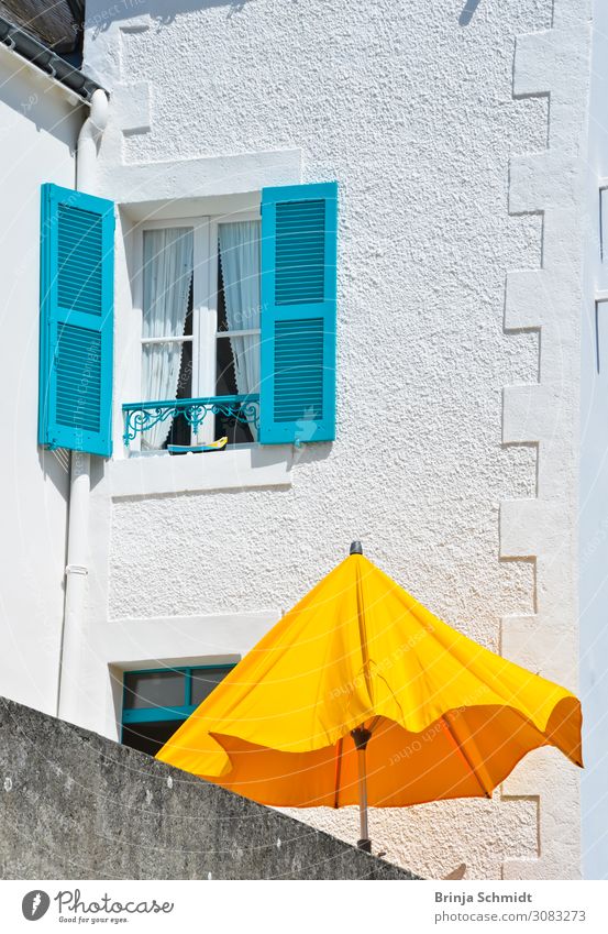 A yellow parasol in front of a turquoise window Harmonious Well-being Contentment Relaxation Vacation & Travel Tourism Trip Far-off places Summer