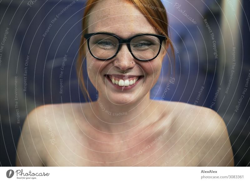 Portrait of a young, smiling woman with freckles and glasses Lifestyle Joy already Young woman Youth (Young adults) 18 - 30 years Adults Piercing Eyeglasses