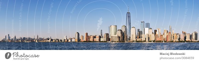 New York City skyline with cloudless sky. Shopping Luxury Vacation & Travel City trip Summer Living or residing Office Sky Beautiful weather River Downtown