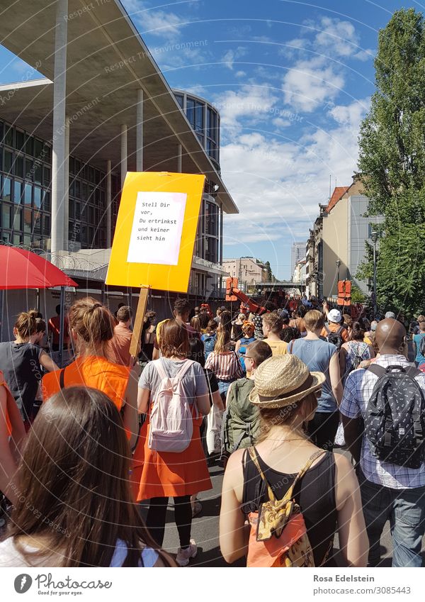 Demonstration in Berlin in sunshine people Civil Society right of demonstration Civil courage Engagement Democracy Life jacket Human rights Politics and state