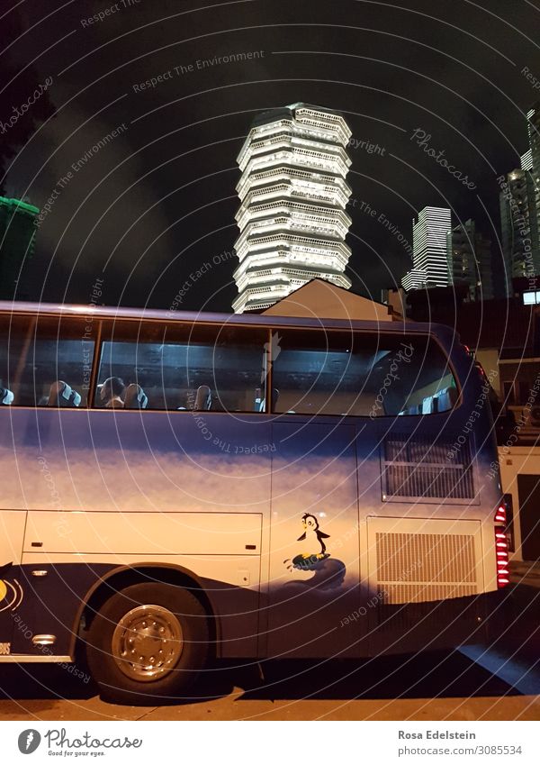Coach in front of high-rise building in Singapore Bus High-rise travel Long distance travel metropolis Asia Night City Town urbanity Tourism Architecture