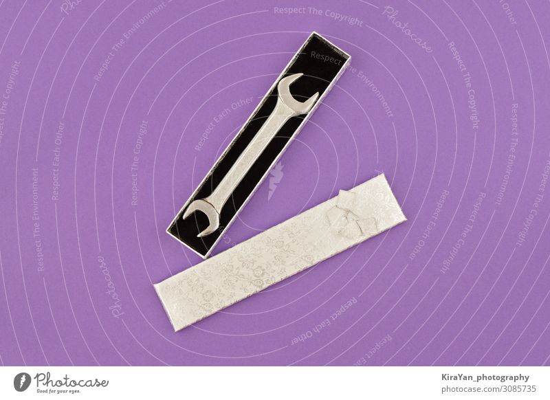 Happy Fathers Day flat lay. Wrench in gift box on purple background father day present wrench fathers best celebrate celebration concept creative dad daddy
