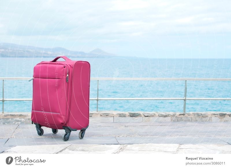 Red travel suitcase Lifestyle Vacation & Travel Tourism Trip Sightseeing Ocean Horizon Suitcase To enjoy Blue White Adventure Discover Far-off places Target
