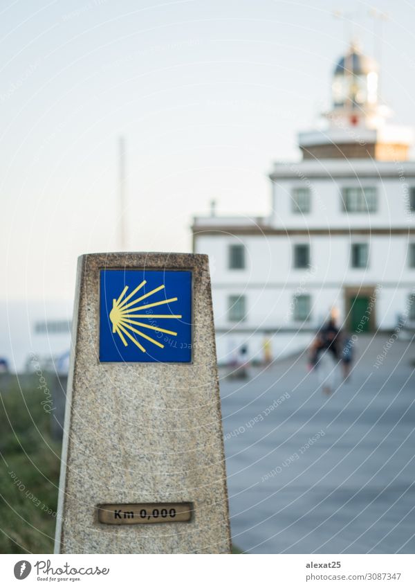 Marker of 0 km in Santiago way in Finisterre ligthouse Vacation & Travel Tourism Summer Ocean Hiking Sky Lighthouse Stone Blue Religion and faith Tradition