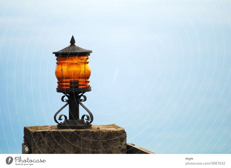 Lamp or lantern in a courtyard driveway on the gate in front of a blue sky in Madeira Lantern Light Lampshade Electric bulb Lighting Sky Highway ramp (entrance)