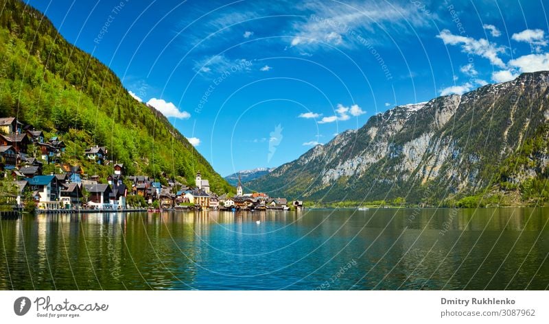 Panorama of Hallstatt village and Hallstatter See, Austria lake Alps scenery mountains Europe place of worship religious building sky pastoral architecture