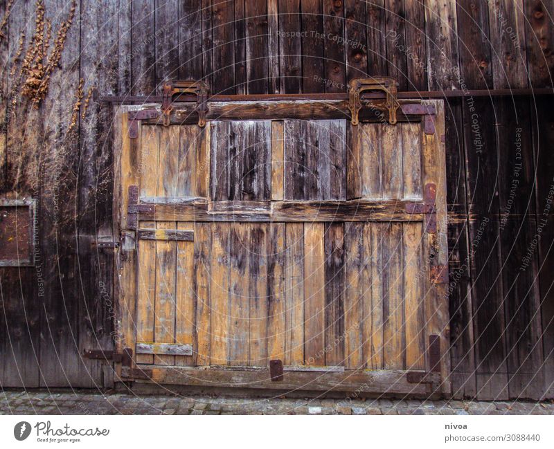Old wooden gate Mountain Machinery Hut Barn Barn door Door Gate Vehicle Wood Utilize Discover Faded Authentic Dark Sustainability Brown Emotions Safety