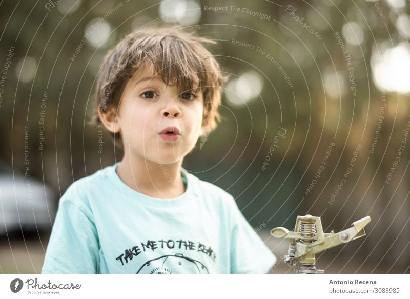 wow kid Happy Summer Garden Child Human being Boy (child) Infancy Autumn Kissing Smiling three years old sprinkler Caucasian real people cnadid whistling 3s