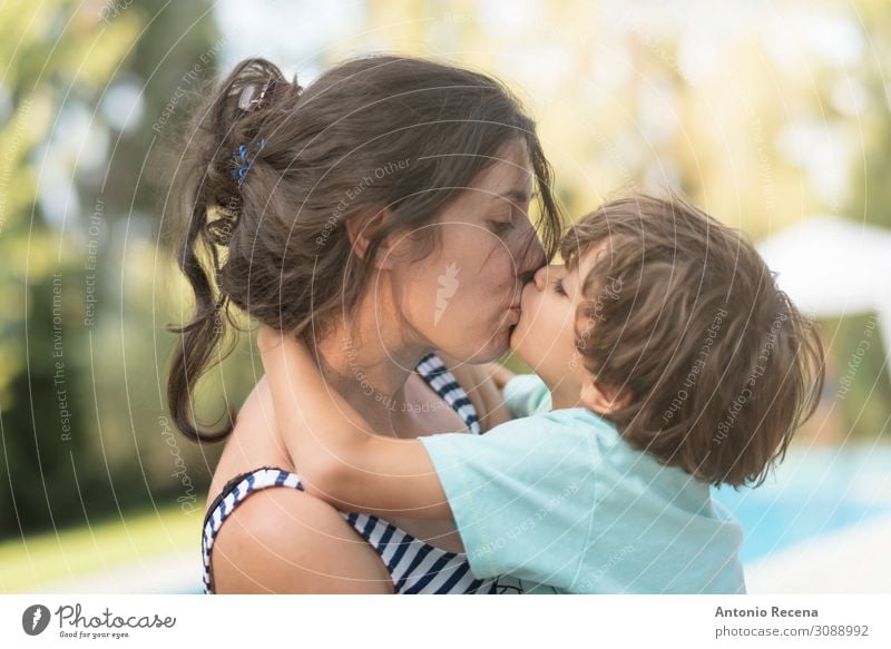 Mother kissing son in garden outdoors images Lifestyle Happy Garden Mother's Day Child Human being Boy (child) Woman Adults Parents Family & Relations Infancy