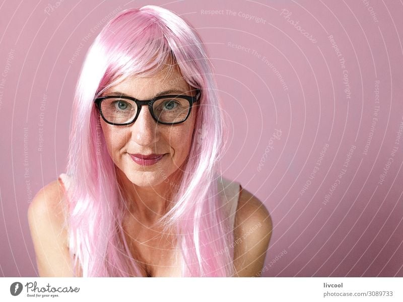 lady with pink hair smiling on pink background Lifestyle Happy Human being Feminine Woman Adults Female senior Head Hair and hairstyles Face Eyes Lips 1