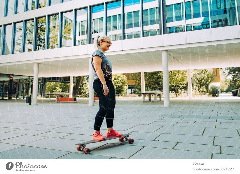 Skating in the City Lifestyle Elegant Style Leisure and hobbies Summer Skateboarding Longboard Young woman Youth (Young adults) 18 - 30 years Adults Town Jeans