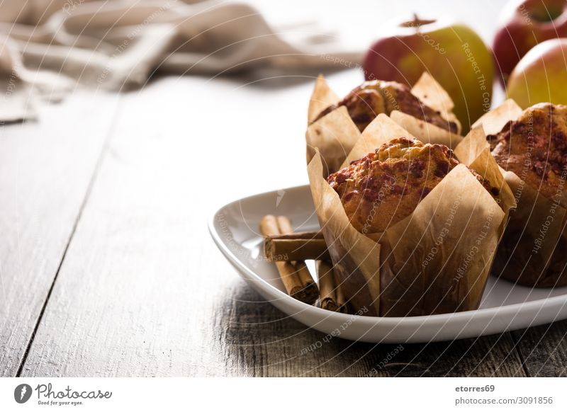 Apples and cinnamon muffins on wooden table. Muffin Cinnamon Baked goods Cake Baking Food Healthy Eating Food photograph Forest Wood Fruit White Brown Home-made
