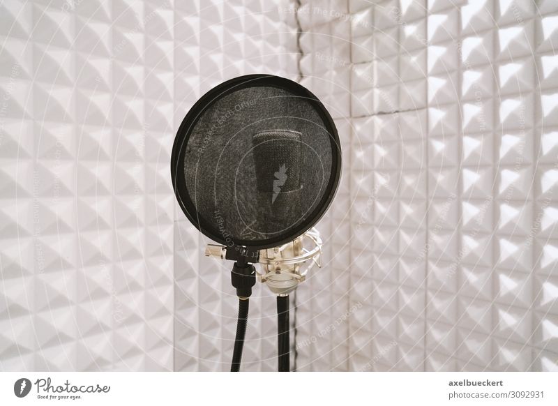 Microphone in speaker's booth Music Media Television Radio (broadcasting) Cinema White Recording studio Sound engineering soundproofed Tone microphone stand