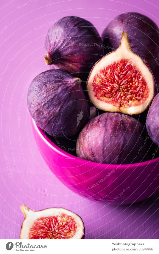 Fresh figs in a pink bowl. Figs close-up Fruit Dessert Nutrition Organic produce Vegetarian diet Diet Bowl Exotic Healthy Eating Delicious Juicy Violet Pink Red