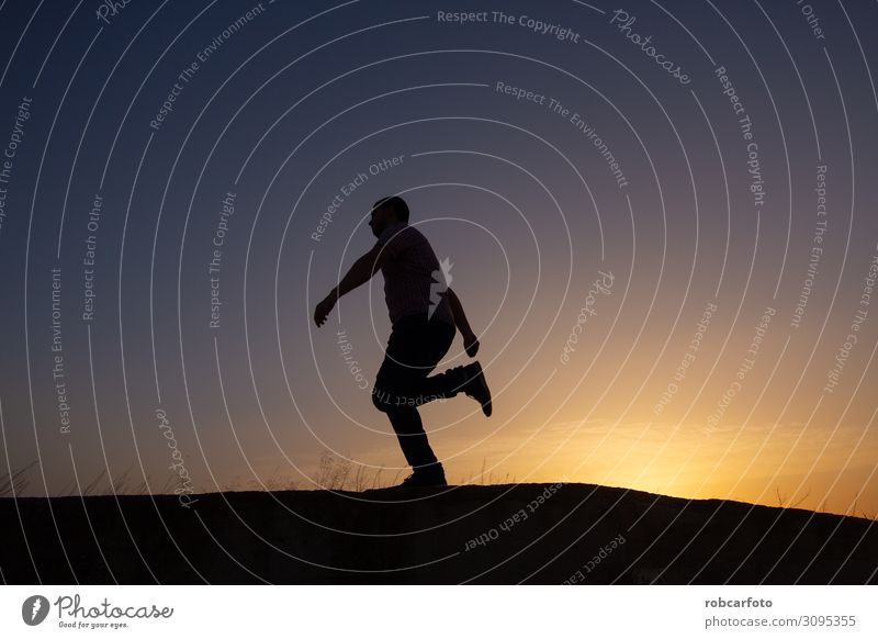 silhouette of man with cell phone at sunset Lifestyle Relaxation Leisure and hobbies Vacation & Travel Summer Sun Sports Jogging Business Human being Man Adults