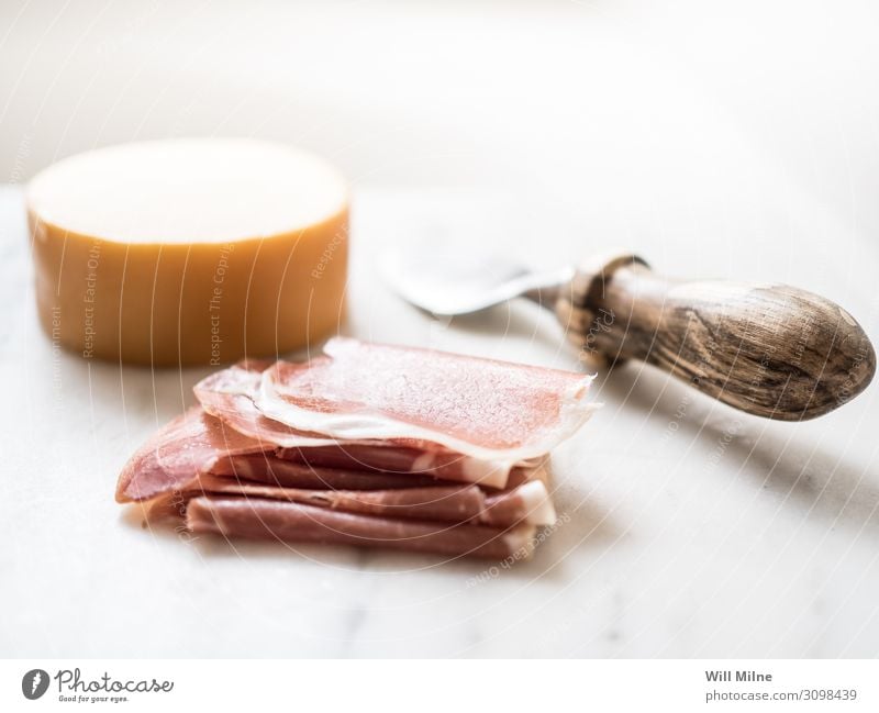 Cheese Board with Ham, Cheese and a Knife Cheese body Dairy Cheese market Food Healthy Eating Dish Food photograph Knives Table-knife Cheese knife Meat
