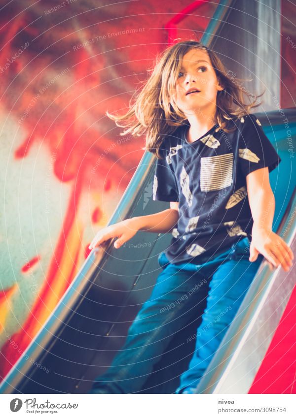 Boy on the slide Playing Skid Slide Volcano Graffiti Boy (child) Hair and hairstyles Face 1 Human being 8 - 13 years Child Infancy Art