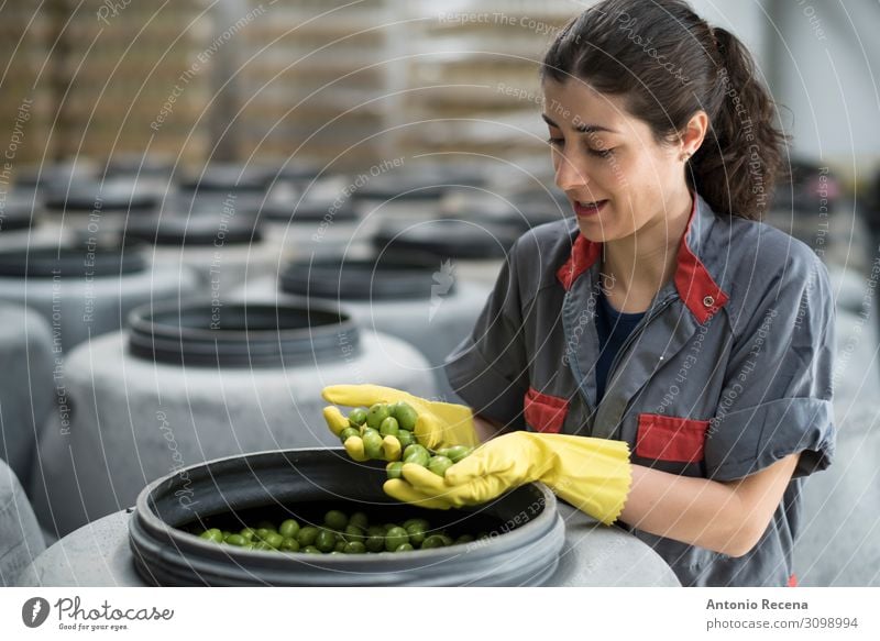 Quality! Fruit Work and employment Profession Workplace Factory Industry Technology Human being Woman Adults Gloves Brunette Packaging Smiling Stand Clean