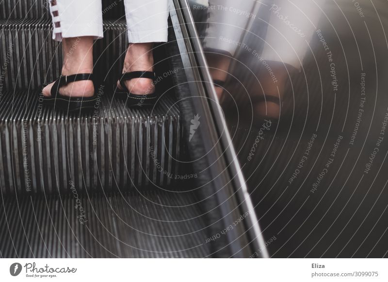 The right page Feminine Woman Adults Female senior Body Legs Feet 1 Human being 45 - 60 years 60 years and older Senior citizen health footwear Sandal Escalator