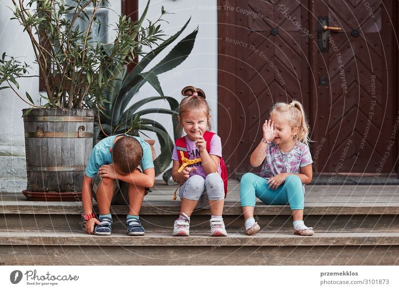 Children making silly faces Joy Happy Face Playing Sister Make Sit Authentic Funny Cute Crazy Emotions girl kid Gesture sign preschooler sibling brother people