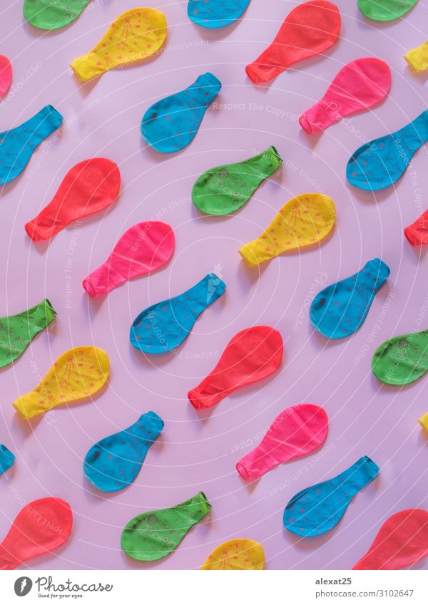 Deflated balloons pattern on pink background Design Playing Decoration Toys Balloon Sphere To enjoy Blue Yellow Green Pink Colour aero aerostat air Blank blow