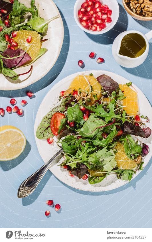 Flatlay of two citrus salad plates Appetizer Rucola cherry tomatoes Lemon Citrus fruits Cooking Delicious Diet Dinner flat flatlay Food Healthy Eating
