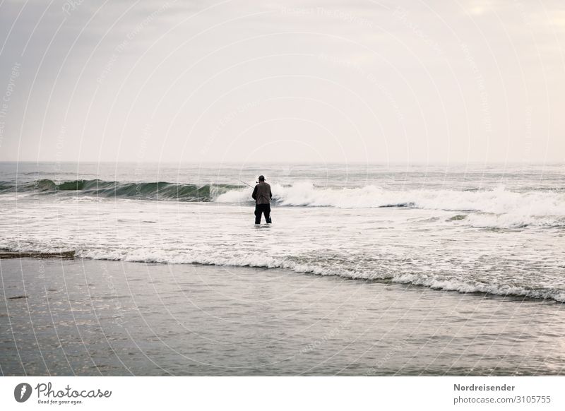The angler in the surf Leisure and hobbies Fishing (Angle) Ocean Human being Masculine Man Adults Nature Landscape Water Sky Clouds Waves Coast Beach North Sea