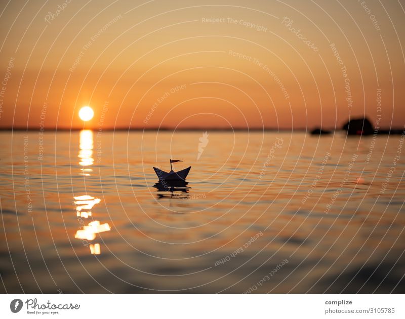 Sunset at the lake with a small paper ship Healthy Relaxation Calm Sauna Swimming & Bathing Vacation & Travel Tourism Summer vacation Beach Ocean Aquatics