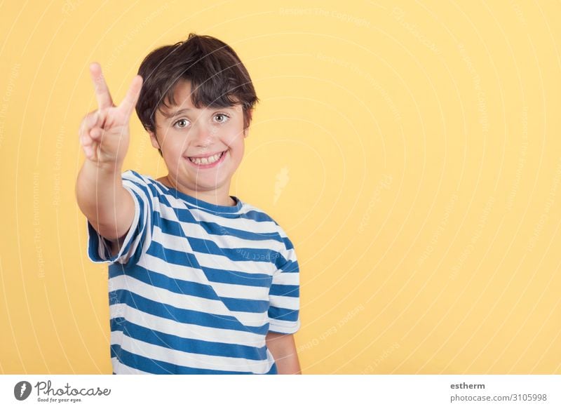 child smiling doing victory sign.Number two Joy Happy Success Human being Masculine Boy (child) Infancy Hand Fingers 1 8 - 13 years Child Digits and numbers