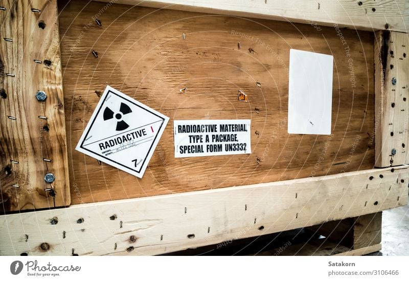 Radiation label beside the transport wooden box Industry Logistics Nuclear Power Plant Transport Package Strongbox Wood Sign Signs and labeling Signage