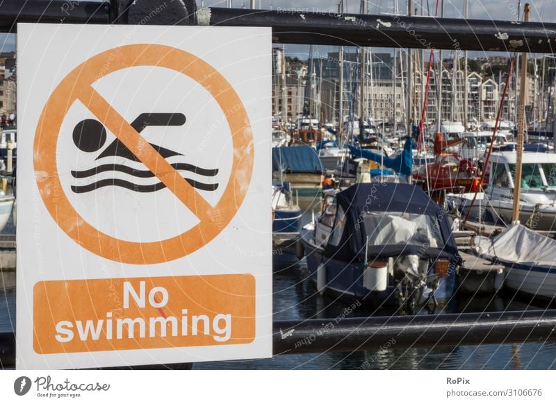 No swimming sign in a marina. Lifestyle Luxury Style Design Leisure and hobbies Vacation & Travel Tourism Trip Sightseeing City trip Cruise Sports Fitness