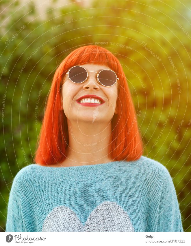 Red haired woman looking up in a park Lifestyle Style Joy Happy Beautiful Relaxation Leisure and hobbies Vacation & Travel Human being Woman Adults Fashion