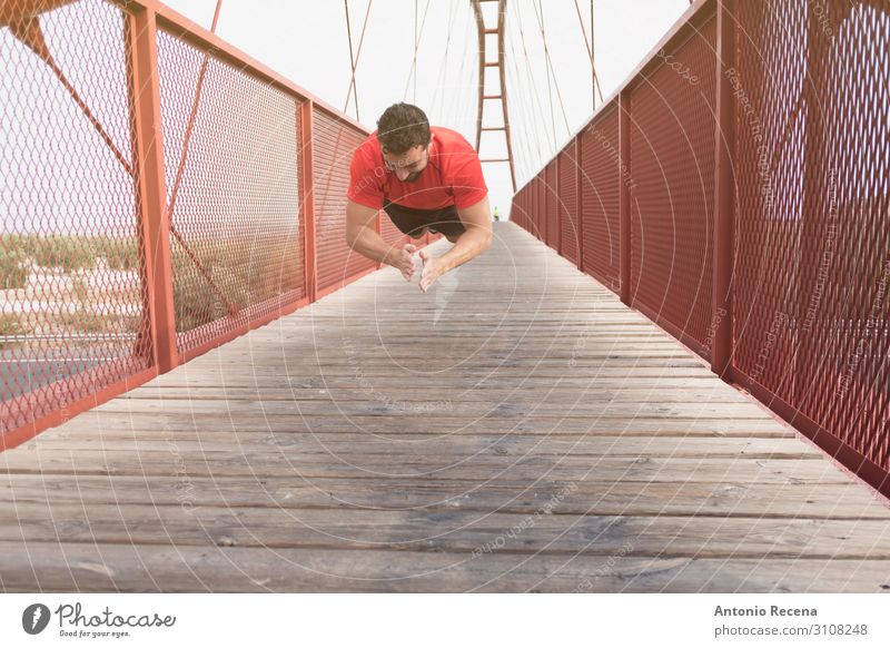 man training push ups on a bridge Sports Human being Man Adults Bridge Pedestrian Beard Fitness Jump Muscular Red Effort Musculature 30s 40s real people candid