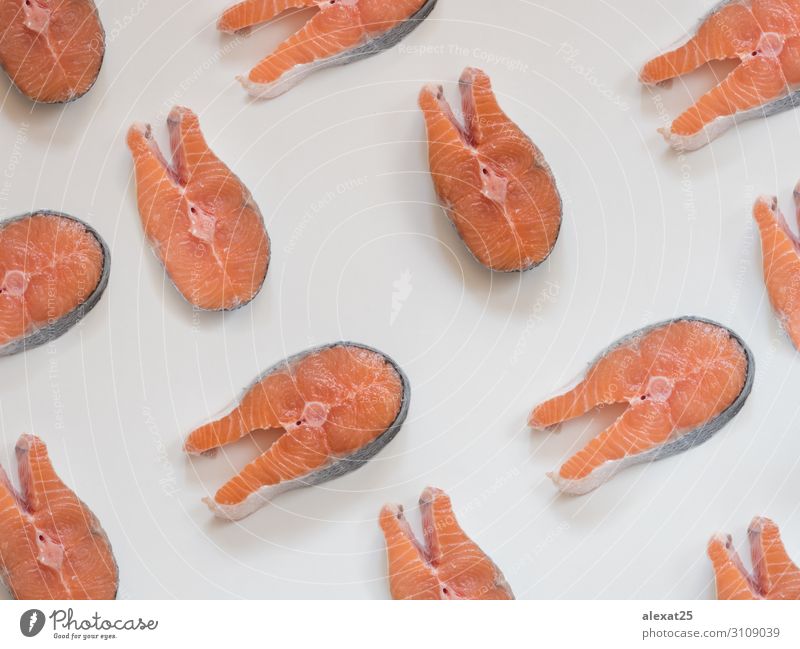 Salmon steak pattern on white background Seafood Ocean Fresh Natural Above Red White Conceptual design Cooking fat fish Gourmet healthy Ingredients isolated