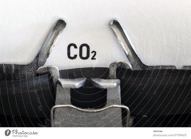 CO2 - carbon dioxide typed on an old typewriter Science & Research Typewriter Energy industry Industry Environment Elements Climate change Stationery Paper Sign
