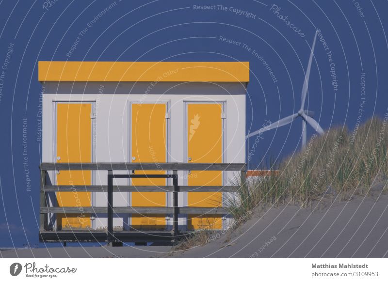 Beach house with windmill Technology Energy industry Renewable energy Wind energy plant Energy crisis Environment Nature Landscape Cloudless sky Summer Coast