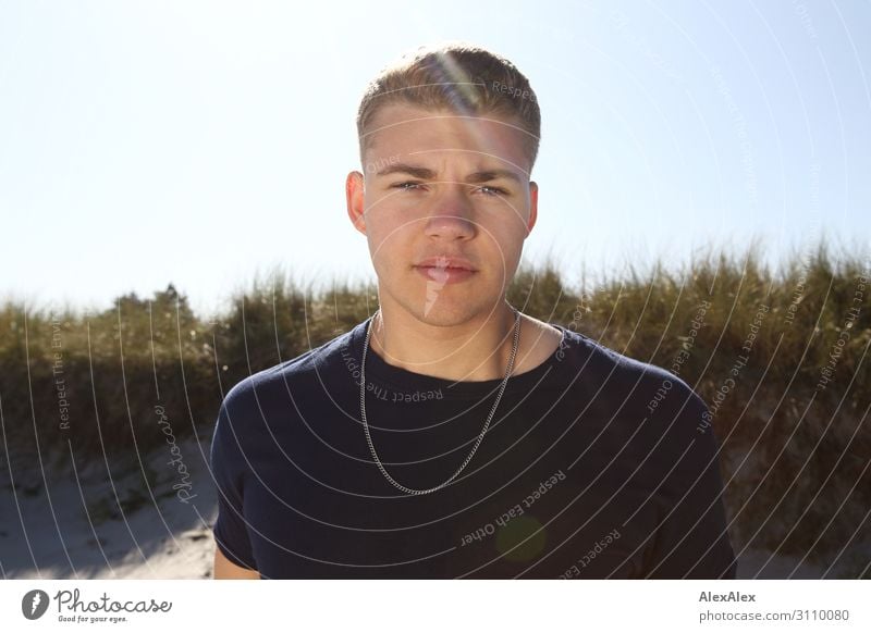 Backlit portrait of a young man in front of a beach dune Lifestyle Style Joy already Summer Summer vacation Sun Young man Youth (Young adults) 13 - 18 years